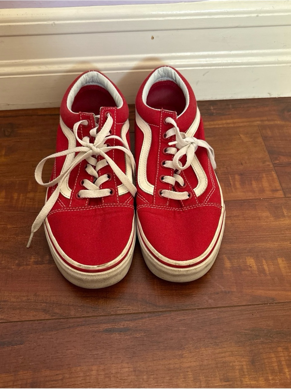 Red old skool Vans with white trim